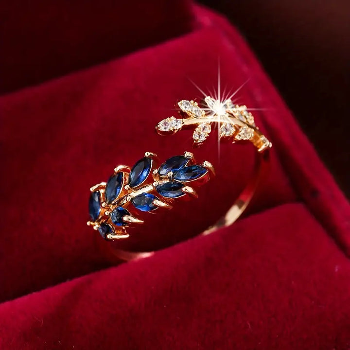 Órla – Rose Gold Ring with Blue Stone in the Center