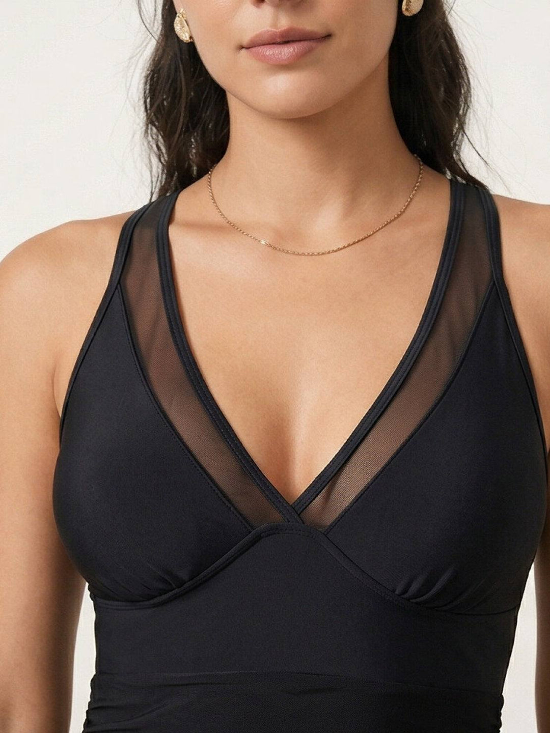 Mesh swimsuit with a waist-slimming effect
