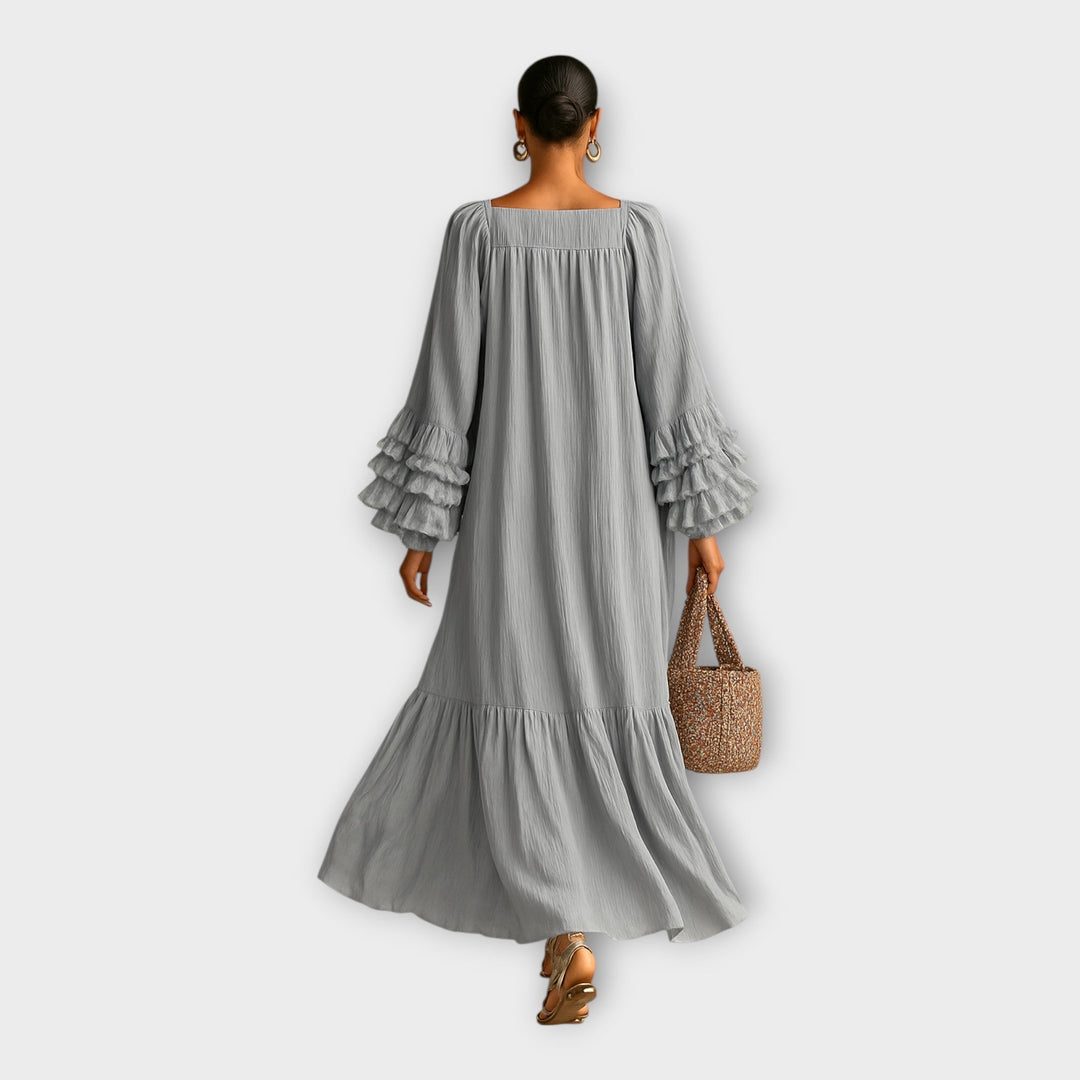 Lang æterisk kjole med elegante detaljer
