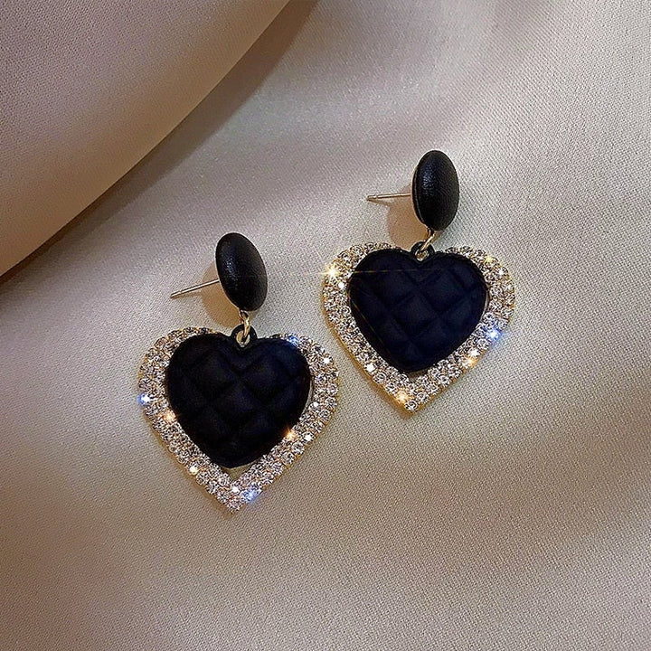 Gold Earrings with Black Heart-Shaped Pendant