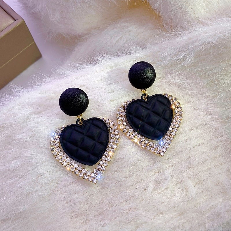 Gold Earrings with Black Heart-Shaped Pendant
