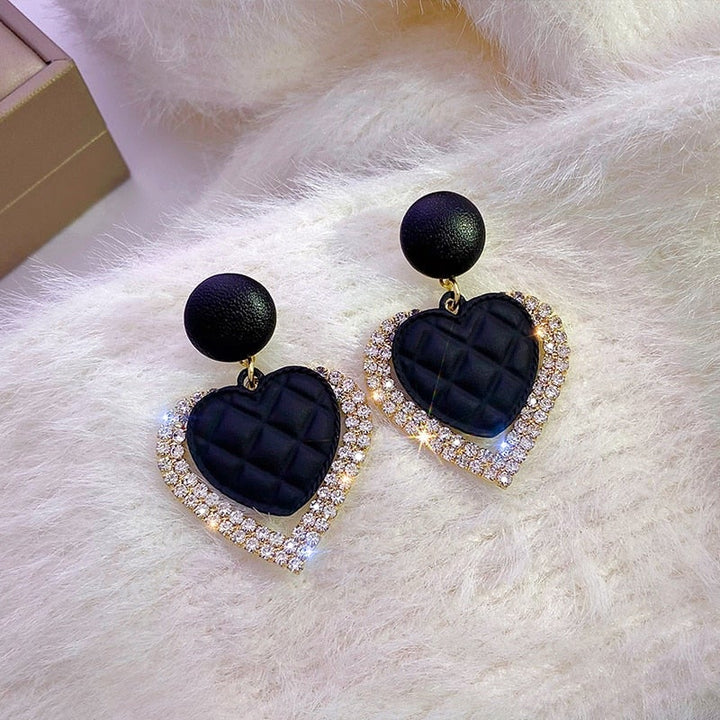 Gold Earrings with Black Heart-Shaped Pendant