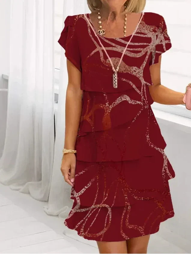 Monika - Elegant kjole med flæser