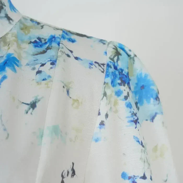 Aoife – Timeless Elegance in Blue Floral Pattern with High Collar
