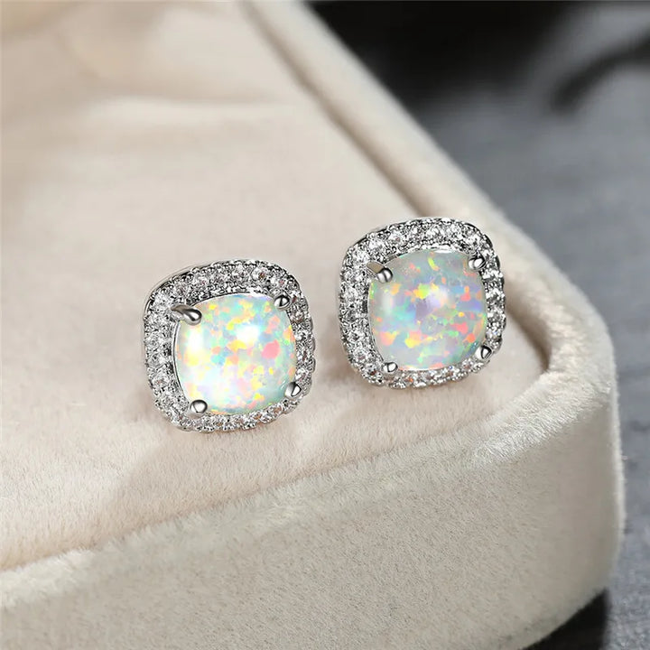 Elegant Silver Earrings with Round White Opals