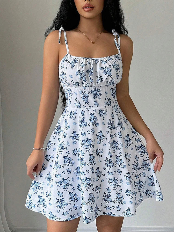 Lara | Short dress with thin straps and floral print