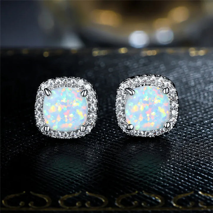Elegant Silver Earrings with Round White Opals