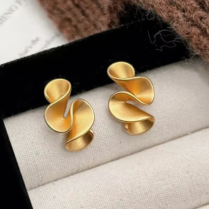 Earrings in Silver and 18 Carat Gold