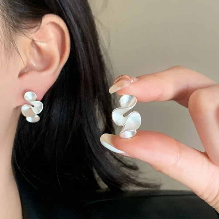 Earrings in Silver and 18 Carat Gold