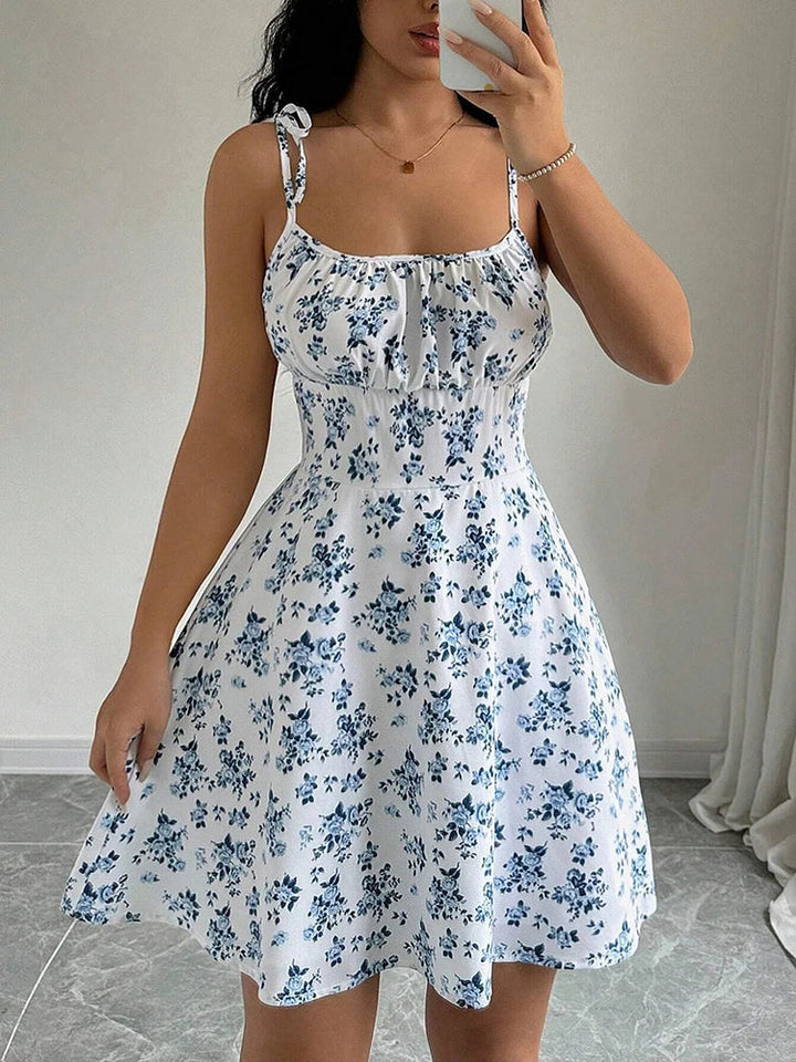 Lara | Short dress with thin straps and floral print