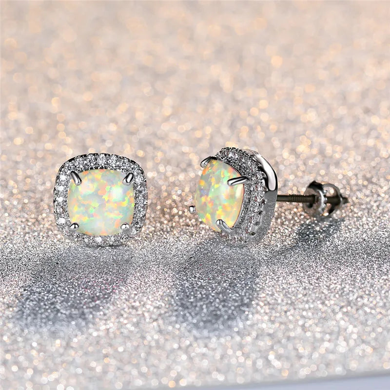 Elegant Silver Earrings with Round White Opals