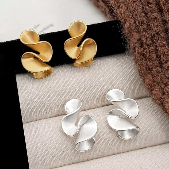 Earrings in Silver and 18 Carat Gold