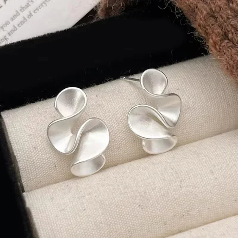 Earrings in Silver and 18 Carat Gold
