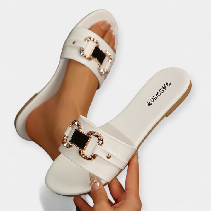 Comfortable slippers with a rounded toe