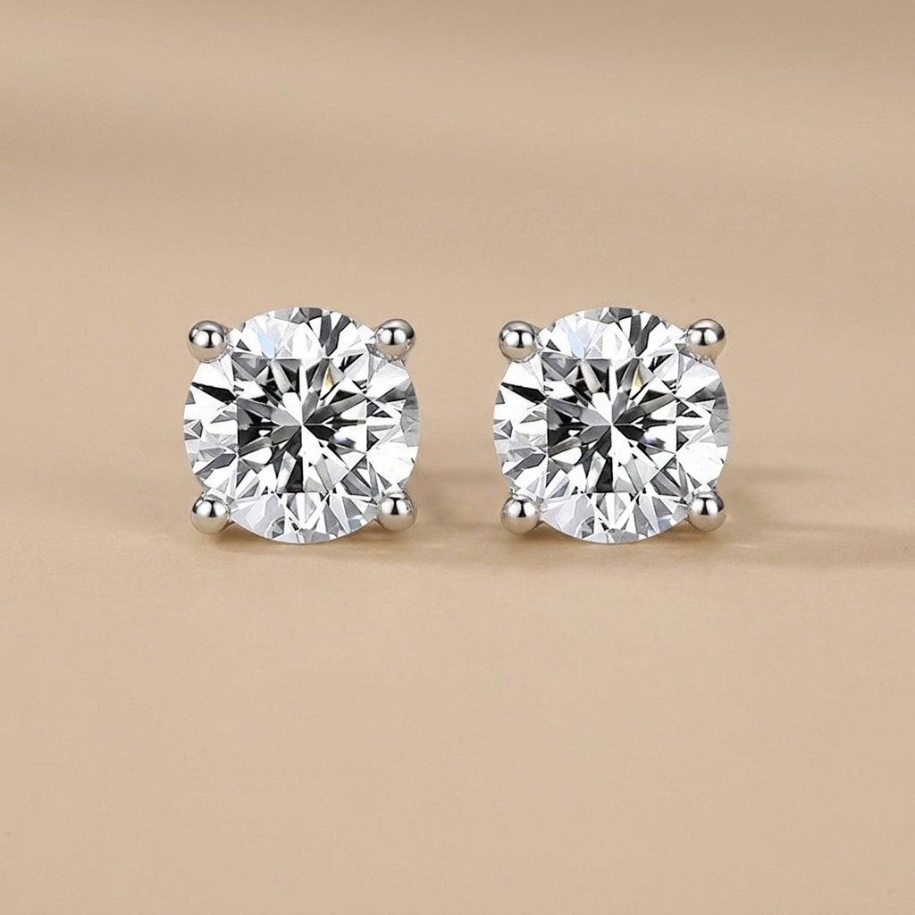 Agnete - Classic solitaire earrings in luxurious moissanite