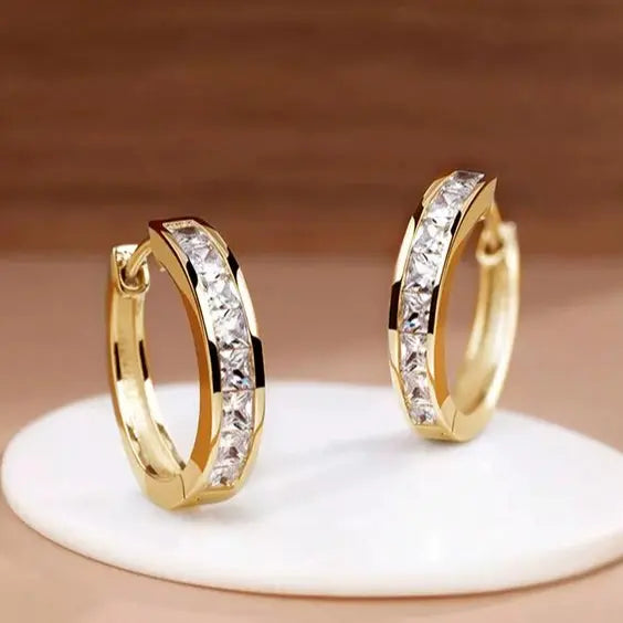 Earrings of Gold and Stylish Crystals
