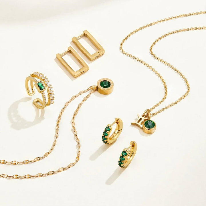 Niamh – Gold Ring with Green Emerald Details.