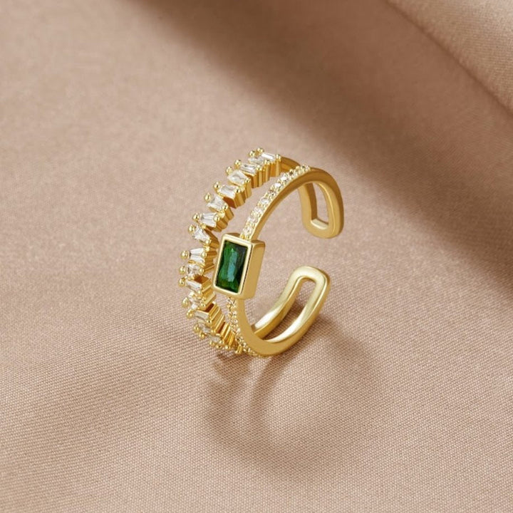 Niamh – Gold Ring with Green Emerald Details.