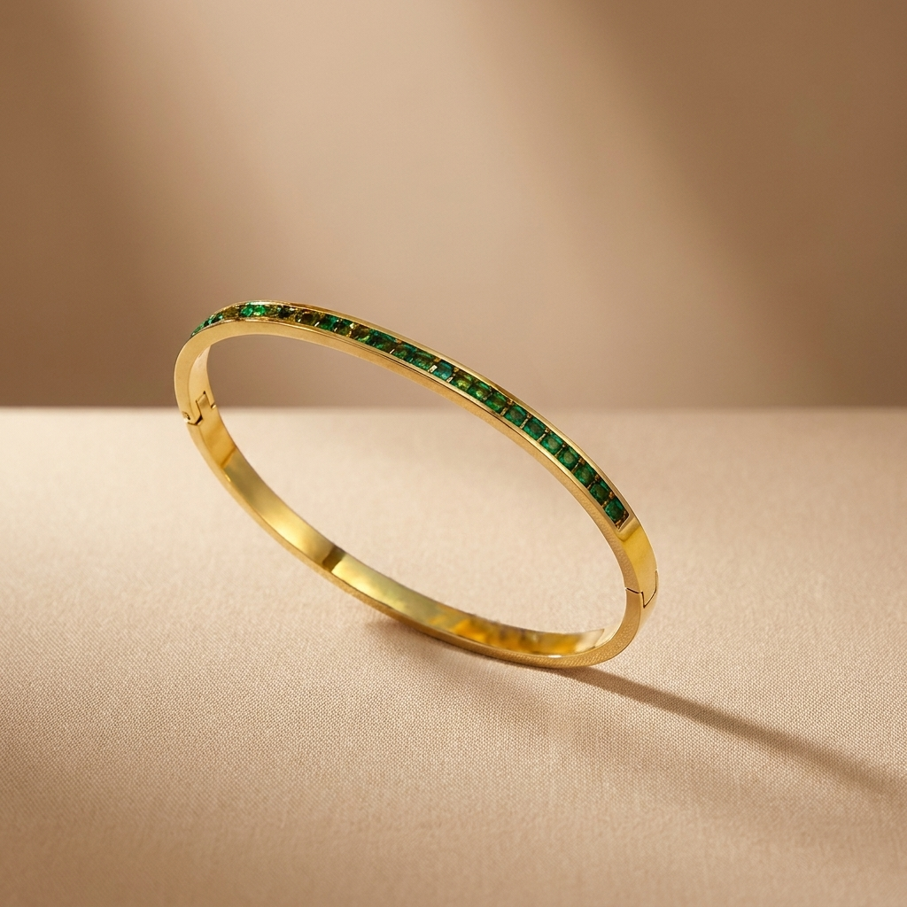 Leonora – Gold-plated bracelet with emeralds